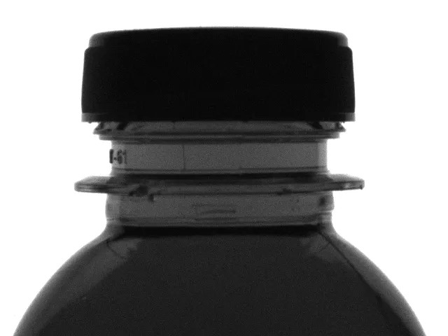 Botol dengan tutup terpasang tapi ring segel hilang.
